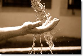 Hand under running water