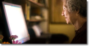 Phyllis Tickle at her computer